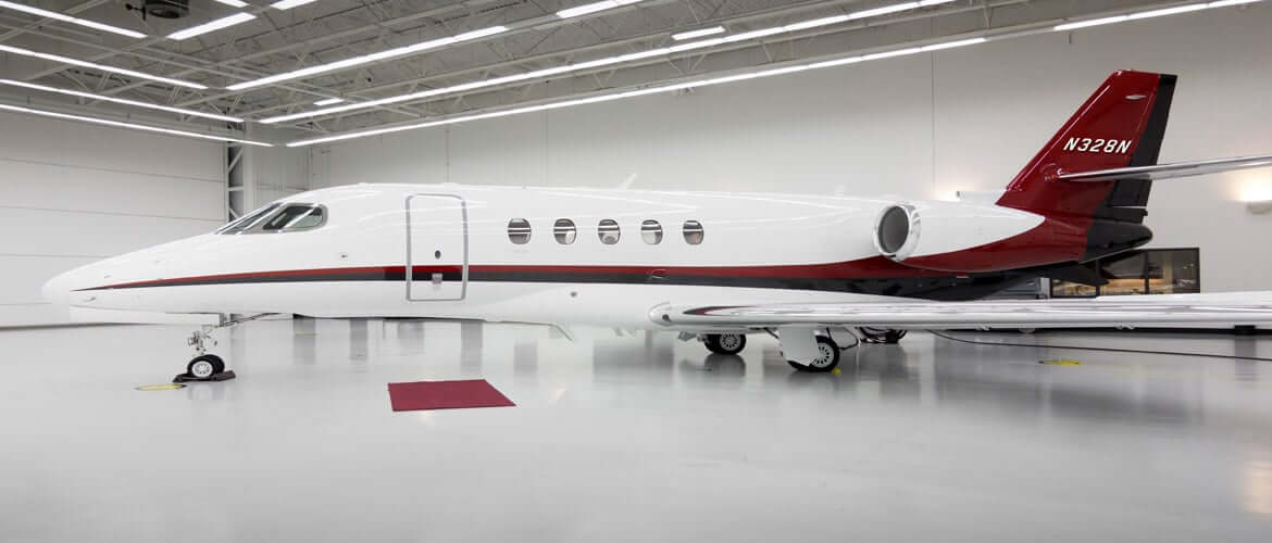 Citation Latitude Inside White Hangar