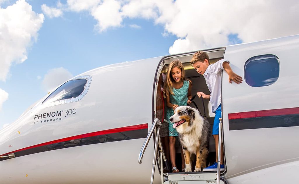 Kids Deboarding Embraer Phenom 300
