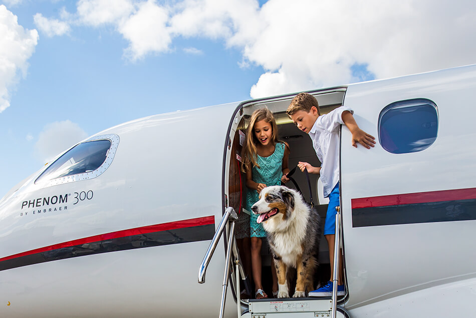 Couple Deboarding Phenom 300