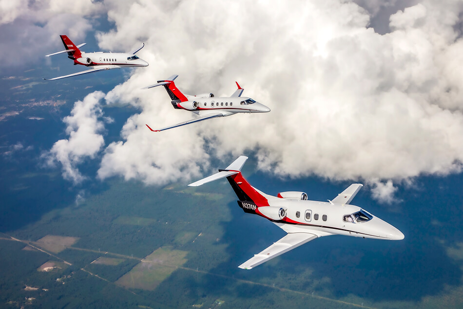 Embraer Phenom 100, Embraer Phenom 300, and Cessna Citation Latitude in Aerial Formation