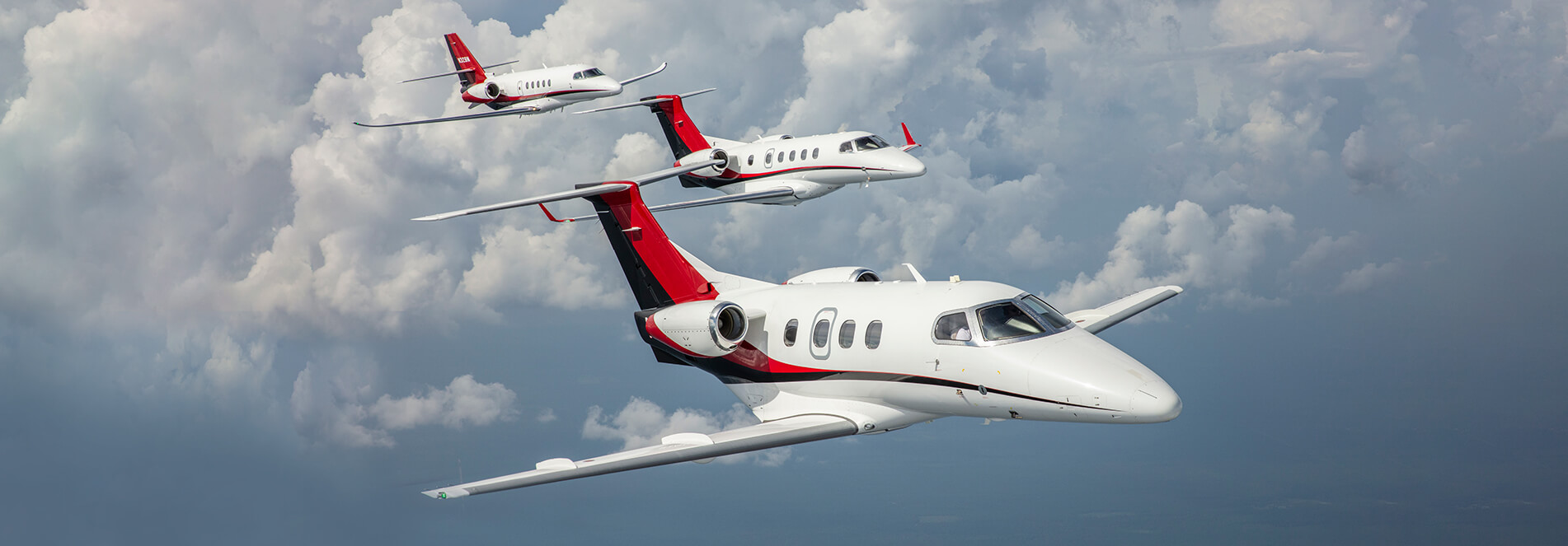 Embraer Phenom 100, Embraer Phenom 300, & Cessna Citation Latitude in Aerial Formation