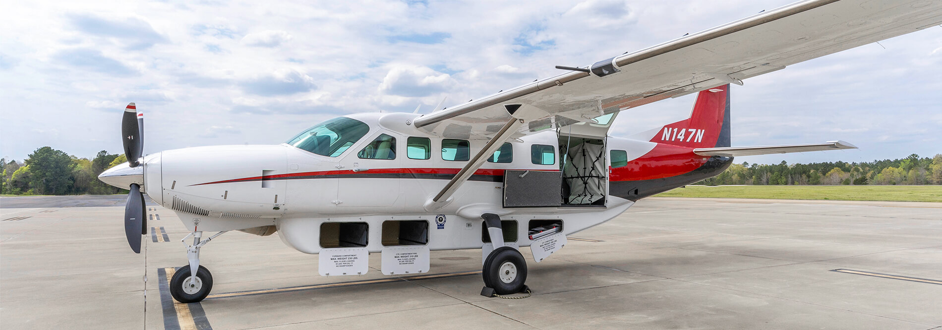 Cessna Caravan Exterior with Cargo Bays Open