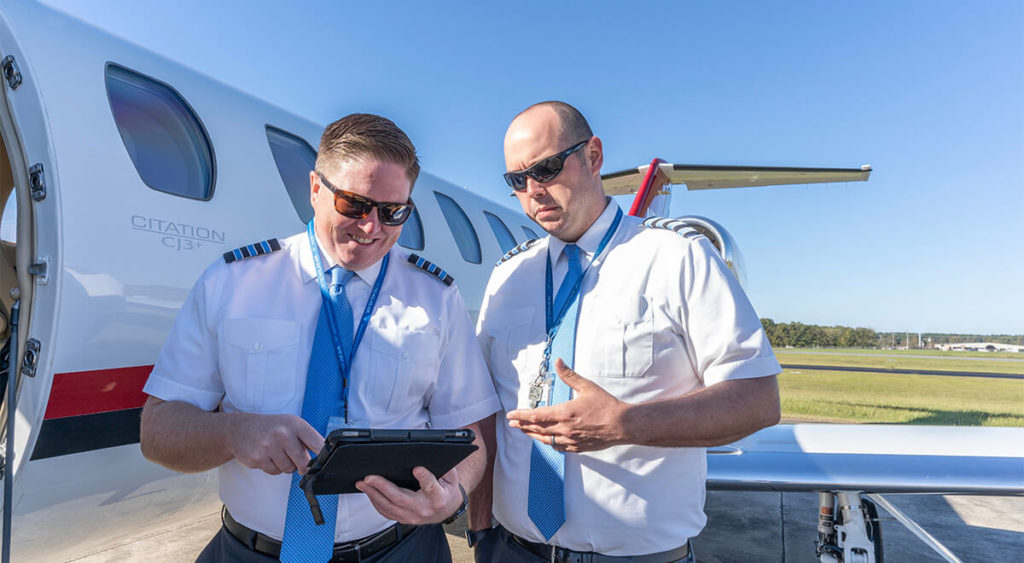 Nicholas Air Pilots During Pre Flight Check